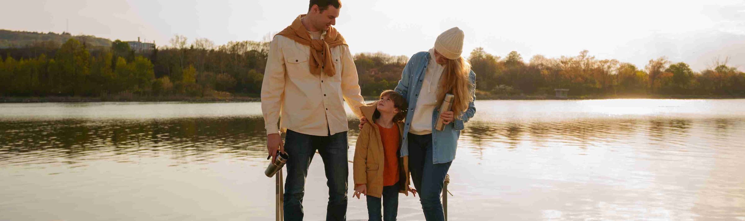 A foster carer and child spending time together outdoors